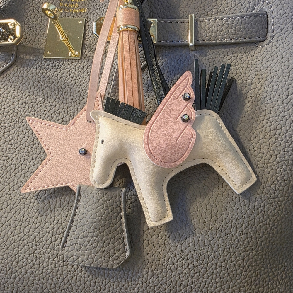 Tan and Pink Pegasus Handbag Charm.